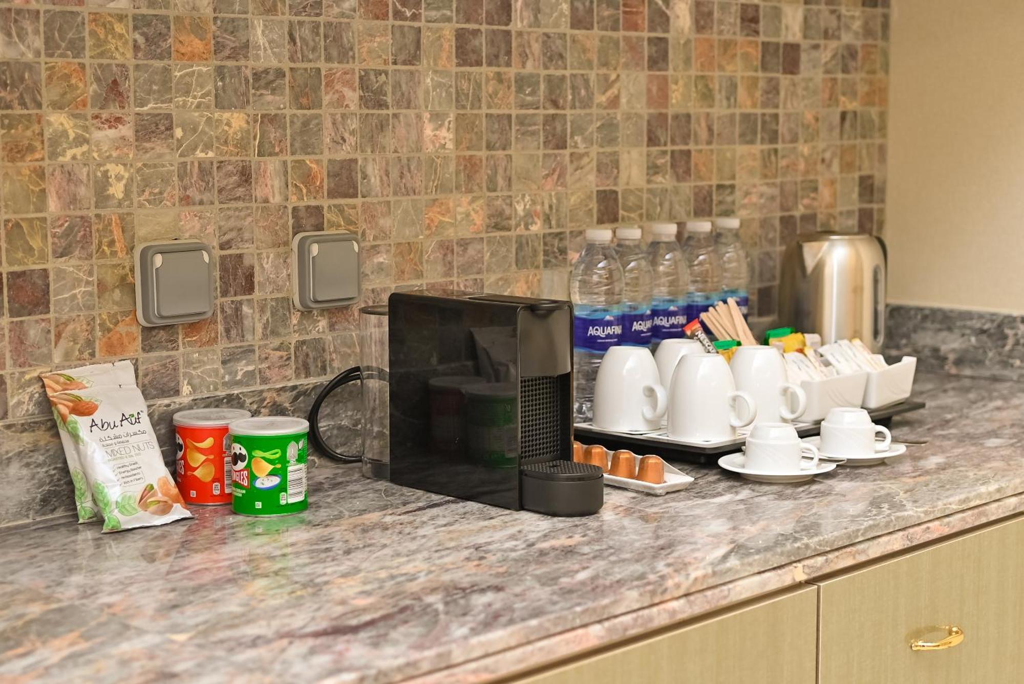 Hilton Hurghada Plaza Hotel Εξωτερικό φωτογραφία A Nespresso coffee machine